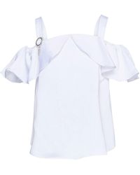 Blusas Guess de mujer: hasta el 56 % de descuento | Lyst