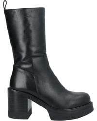 Paloma Barceló - Botines de caña alta - Lyst