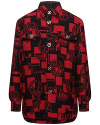 red versace shirt
