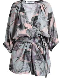 Femme Vêtements Combinaisons Combishorts Combishort asymétrique à rayures Coton IRO en coloris Neutre 