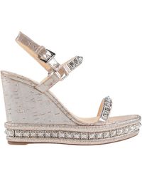 louboutin femme compensé