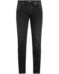 Versace - Pantaloni Jeans - Lyst
