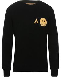 A. FOUR LABS Pullover - Negro