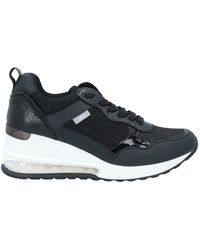 xti slip on trainers