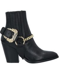 versace jeans knee high buckle boots