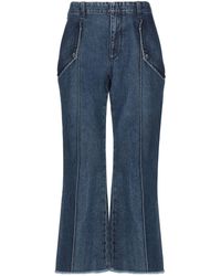 Acne Studios Denim Bedruckte Schlaghose aus Samt in Blau Damen Bekleidung Jeans Schlagjeans 