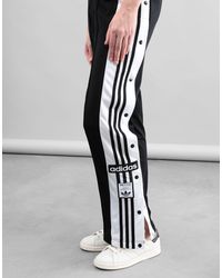 Midler Kæmpe stor forvrængning adidas Originals Adibreak Tp Pants, Varsity-striped Pattern in Orange - Lyst