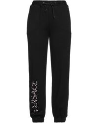 Versace - Pants - Lyst