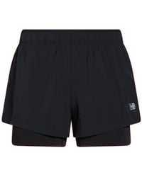New Balance - Shorts & Bermuda Shorts Recycled Polyester, Elastane - Lyst