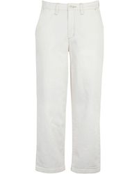 pantalones vans mujer dorados