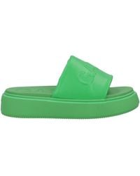 Ganni - Logo Embossed Faux Leather Slides - Lyst