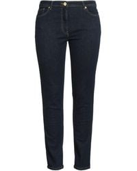 Versace - Pantaloni Jeans - Lyst
