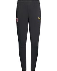 PUMA - Pants Polyester, Elastane - Lyst