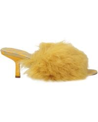 Burberry - Mules "Minnie" mit Lammfell - Lyst