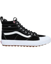 black and pink vans high tops