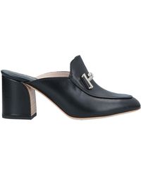tods mules in leather