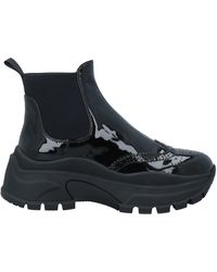 Botas Prada de mujer: hasta el 67 % de descuento | Lyst
