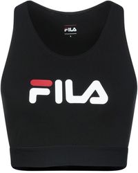 Fila Sleeveless and tank Women Up to 78% off Lyst.com