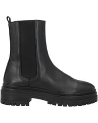 Bobbies - Botines de caña alta - Lyst
