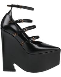 Versace - Pumps Tempest in pelle con platform - Lyst