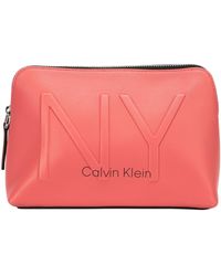 calvin klein dressed up pouch on chain