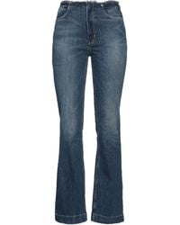 Guess - Pantaloni Jeans - Lyst