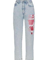 Cotton stretch low waist jeans di Roberto Cavalli in Blu Donna Abbigliamento da Jeans da Jeans a zampa e a campana 12% di sconto 