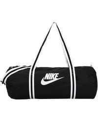 bolsos nike hombre dorados