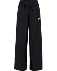 Pantalones anchos y de harem Nike para mujer en rebajas | FASHIOLA.mx