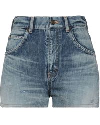 Shorts de jeans deshilachados Saint Laurent de Denim de color Azul Mujer Ropa de Shorts 