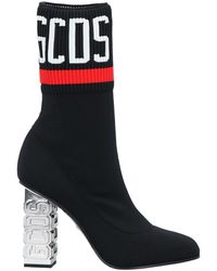 Stivali Gcds da donna - Fino al 54% di sconto | Lyst