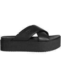 Calvin Klein - Logo-Debossed Flatform Slides - Lyst