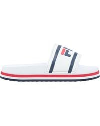 Fila Flip-flops and slides for Women - Up to 37% off at Lyst.com