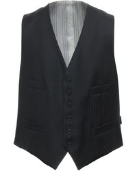 black collarless fur jacket