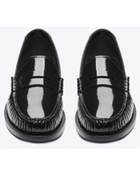 Saint Laurent - Le loafer penny slippers mit monogramm aus lackleder schwarz - Lyst