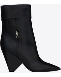 Saint Laurent Niki Booties In Smooth Leather And Silver-tone Monogram - Black