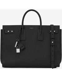 Saint Laurent Holdalls and weekend bags for Men - Up to 20% off at Lyst.com