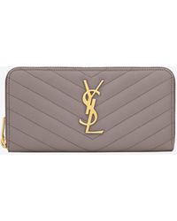 monogram zip around wallet in grain de poudre embossed leather