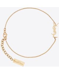 saint laurent opyum charm bracelet in gold brass