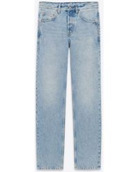 Saint Laurent - Lange baggy-jeans aus denim - Lyst