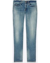 saint laurent ripped jeans mens