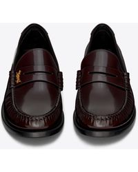 Saint Laurent Le loafer monogram penny slippers aus glattleder - Schwarz