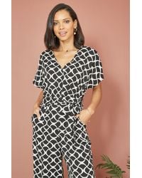 Yumi' - Geometric Print Wrap Jumpsuit - Lyst