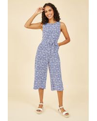 Mela London - Mela Ditsy Floral Print Culotte Jumpsuit - Lyst