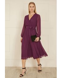 Yumi' - Plum Pleated Wrap Midi Dress With Sheer Long Sleeves - Lyst