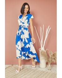 Yumi' - Blossom Print Wrap Midi With Dipped Hem - Lyst