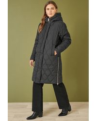 Yumi' - Padded Quilted Long Coat With Zip Detail And Hood - Lyst