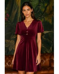 Yumi' - Velvet Skater Dress With Dimante Bow Detail - Lyst