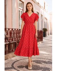 Yumi' - Broderie Anglaise Wrap Midi Dress With Flower Embroidery - Lyst