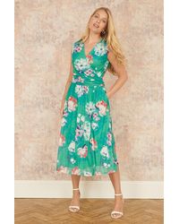 Yumi' - Blossom Print Stretch Mesh Dress With Pockets - Lyst